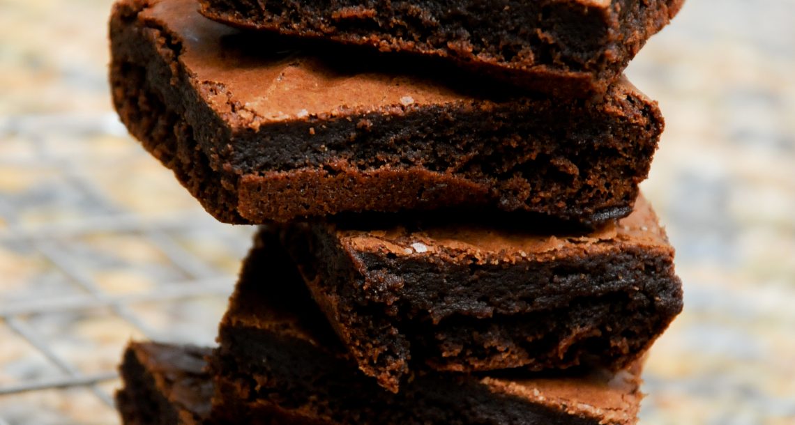 a stack of gorgeous chocolate brownies, which have been made using the West African 70% chocolate powder. The recipe can be found on the side of the pack.