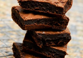 a stack of gorgeous chocolate brownies, which have been made using the West African 70% chocolate powder. The recipe can be found on the side of the pack.